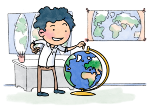 A male geography teacher pointing to the top of a very large globe, in the background are his desk and several maps.